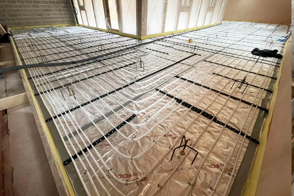 Wet Underfloor Heating system exposed before floor is laid